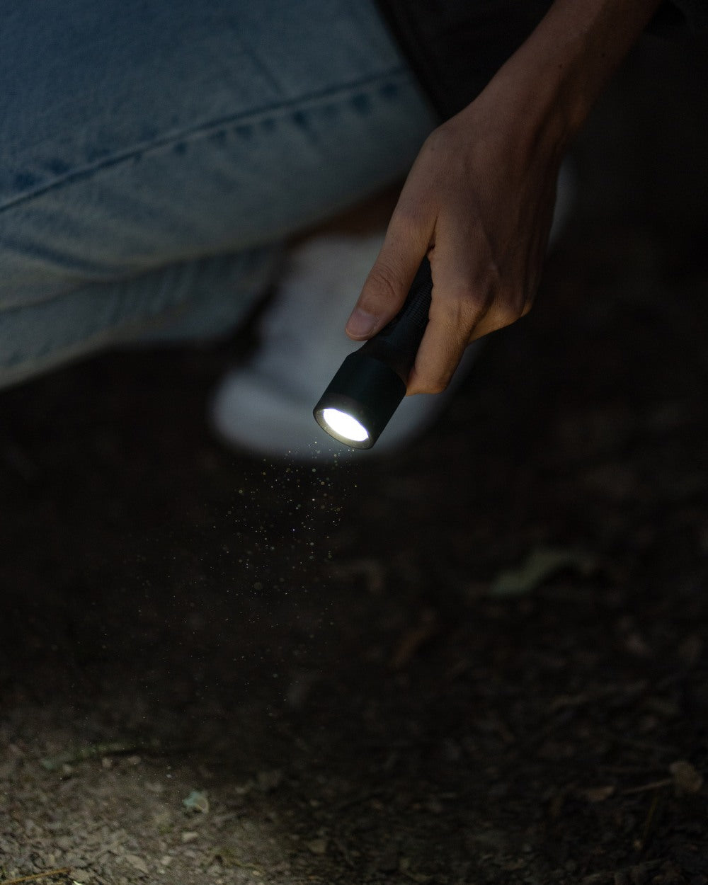 Black coloured Led Lenser P5R Core Rechargeable Torch on street background #colour_black