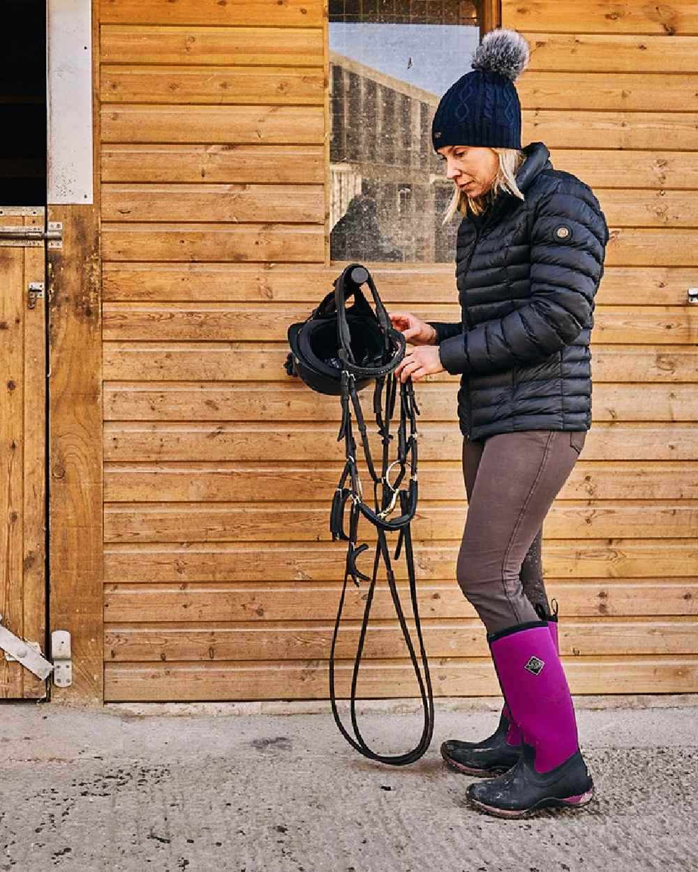 Maroon Coloured Muck Boots Womens Arctic Adventure Tall Boots on outdoor background #colour_maroon