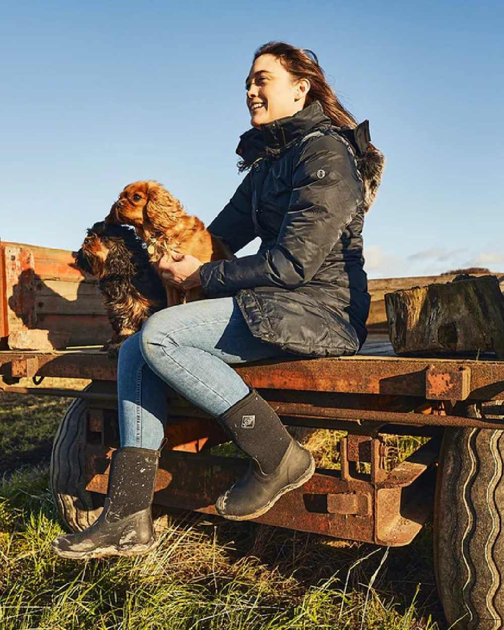 Black Coloured Muck Boots Womens Arctic Weekend Mid Wellingtons on countryside background #colour_black