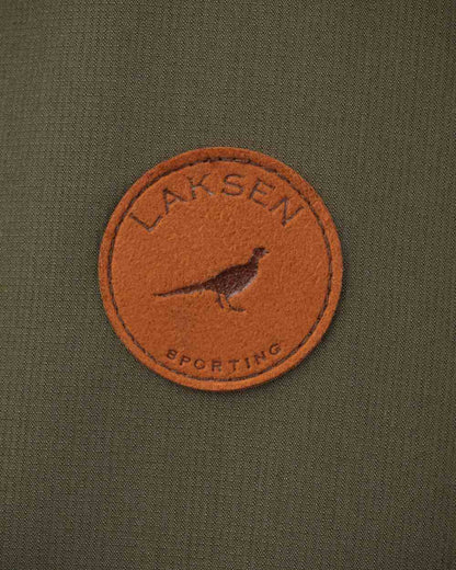 Olive Coloured Laksen Marsh Shooting Coat With CTX On A White Background