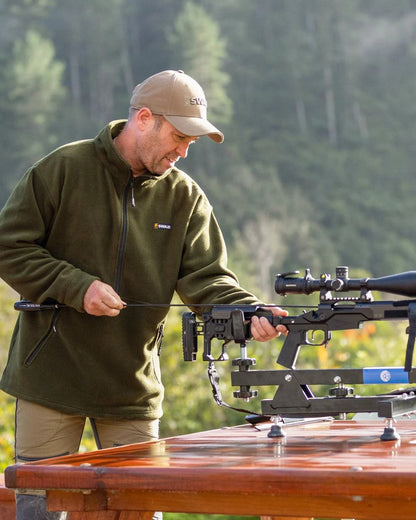 Olive Coloured Swazi Doughroaster on forest background #colour_olive