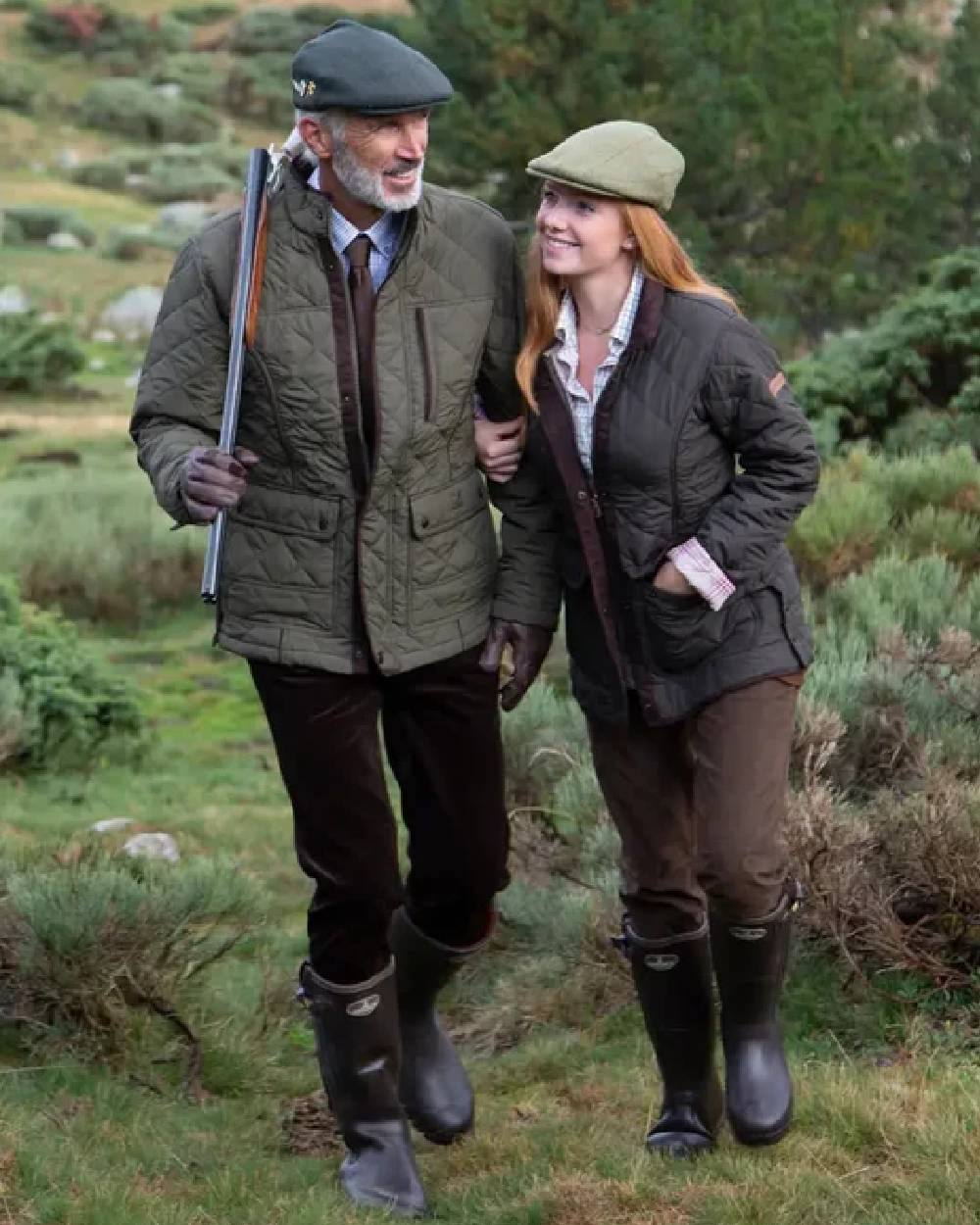 Brown coloured Percussion Ladies Edinburgh Quilted Jacket on forest background #colour_brown