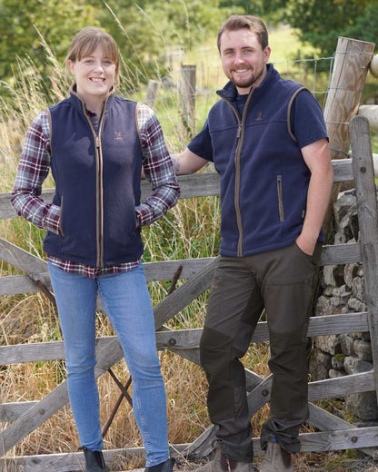 Navy coloured Percussion Ladies Scotland Fleece Gilet on farm background #colour_navy