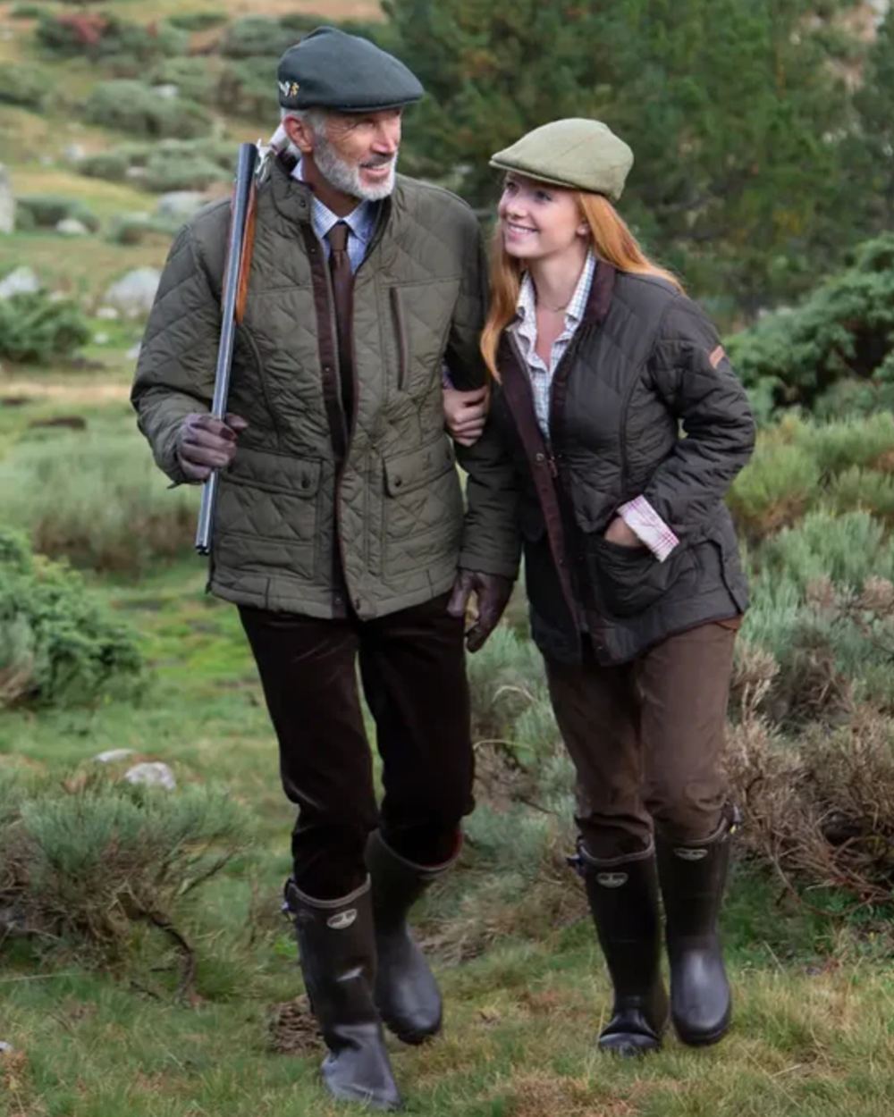 Dark Brown coloured Percussion Stallion Quilted Jacket on forest background #colour_dark-brown