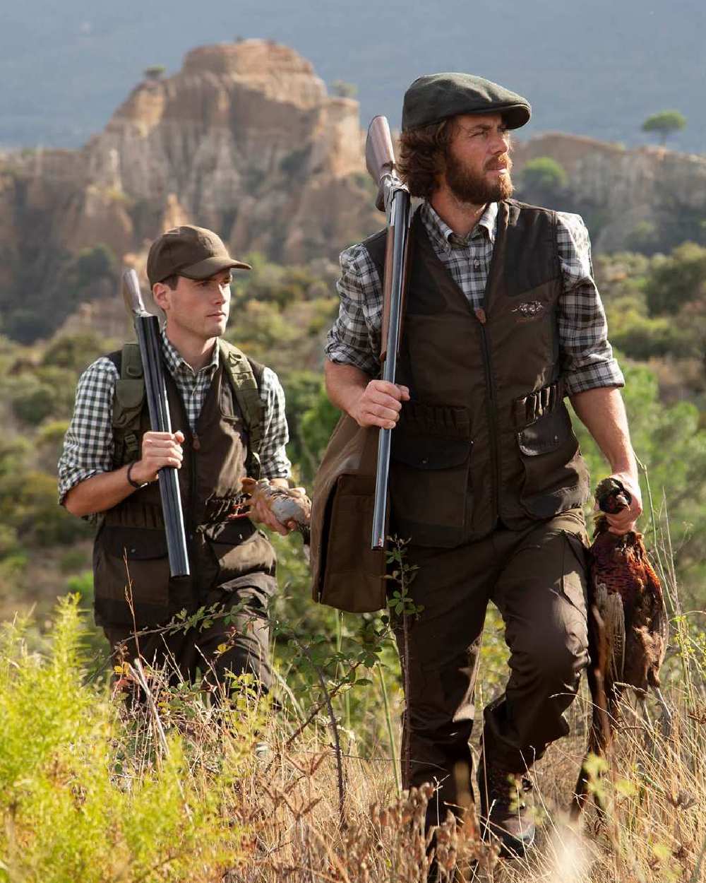 Light Khaki coloured Percussion Tradition Bush Trousers on mountain background #colour_light-khaki