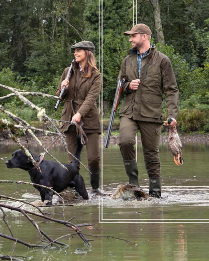 Light Khaki coloured Percussion Tradition Jacket on forest background #colour_light-khaki