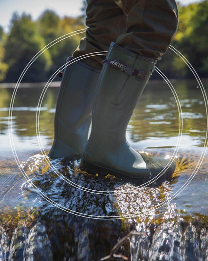 Green coloured Percussion Tradition Wellington Boots on white background #colour_green