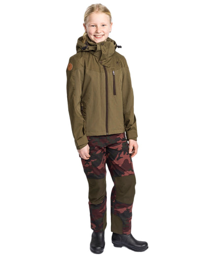 Dusty Plum Jungle coloured Pinewood Childrens Lappland Camou Trousers on white background #colour_dusty-plum-jungle