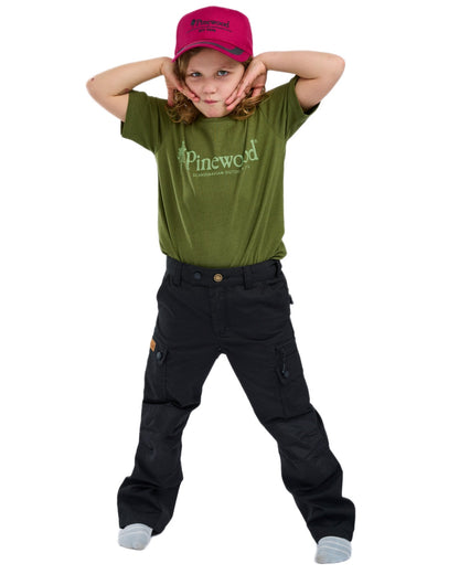 Black coloured Pinewood Childrens Lappland Trousers on white background #colour_black