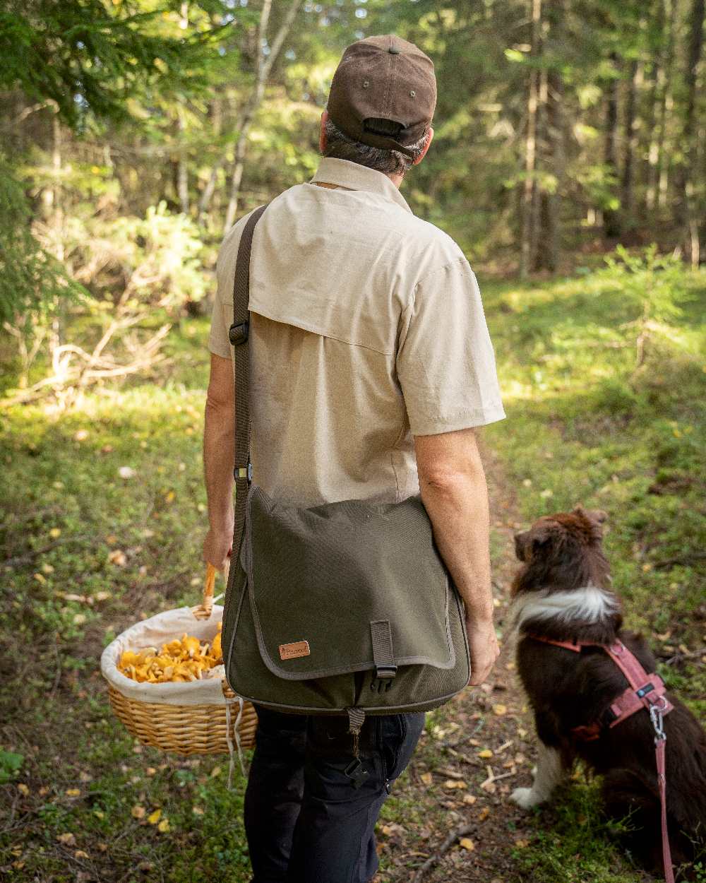 Moss Green Coloured Pinewood Dog Sports Shoulder Bag on outdoor background #colour_moss-green