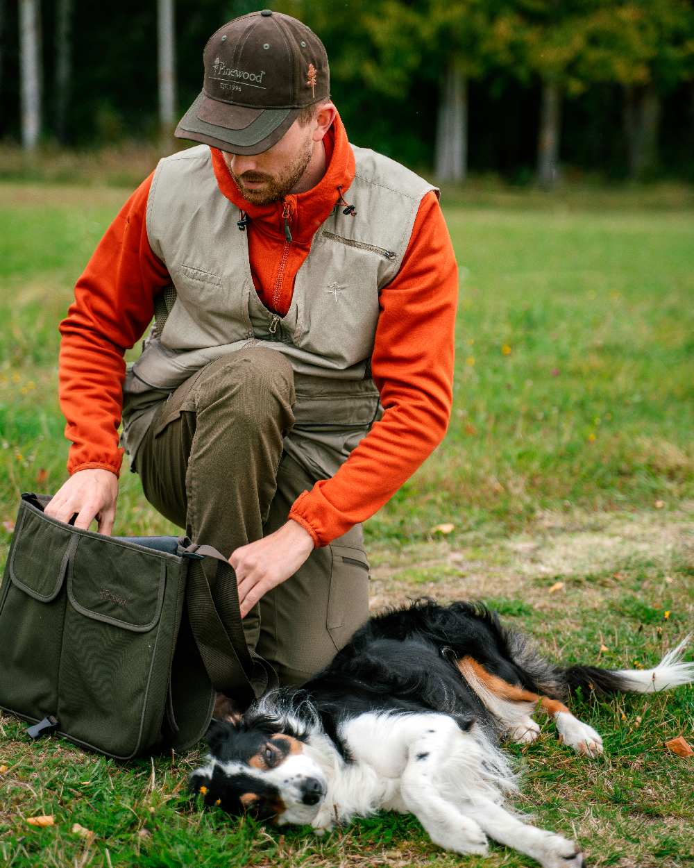 Moss Green Coloured Pinewood Dog Sports Shoulder Bag on outdoor background #colour_moss-green