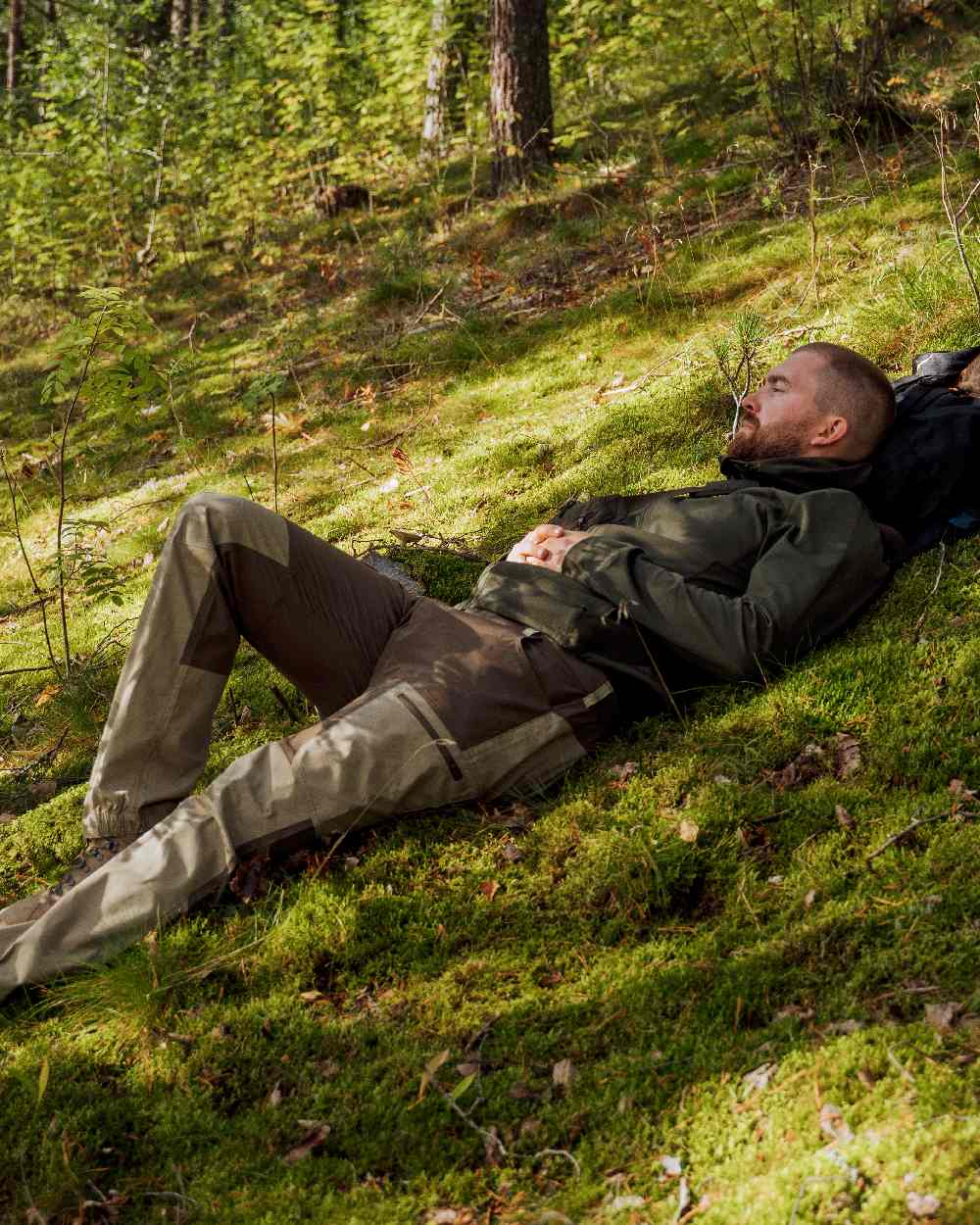 Moss Green Coloured Pinewood Finnveden Hoodie on outdoor background #colour_moss-green