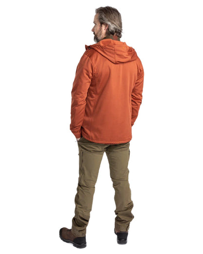 Terracotta coloured Pinewood Finnveden Hoodie on white background #colour_terracotta
