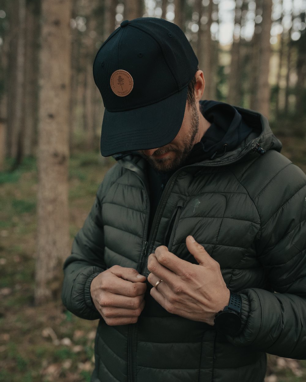Black Coloured Pinewood Finnveden Hybrid Cap on outdoor background #colour_black