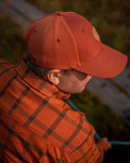 Terracotta Coloured Pinewood Finnveden Hybrid Cap on outdoor background #colour_terracotta