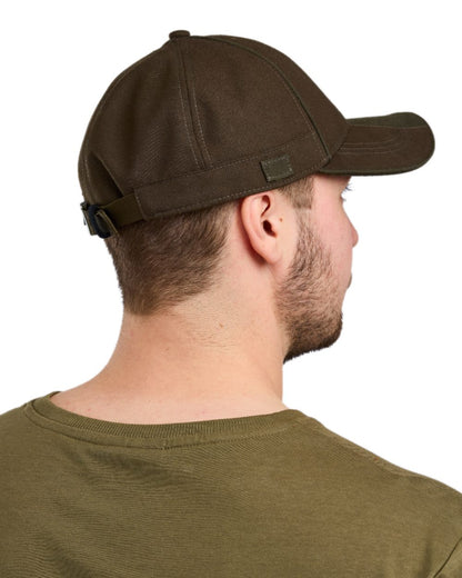 Suede Brown Mossgreen Coloured Pinewood Furudal Hunters Waterproof Cap on white background #colour_suede-brown-mossgreen