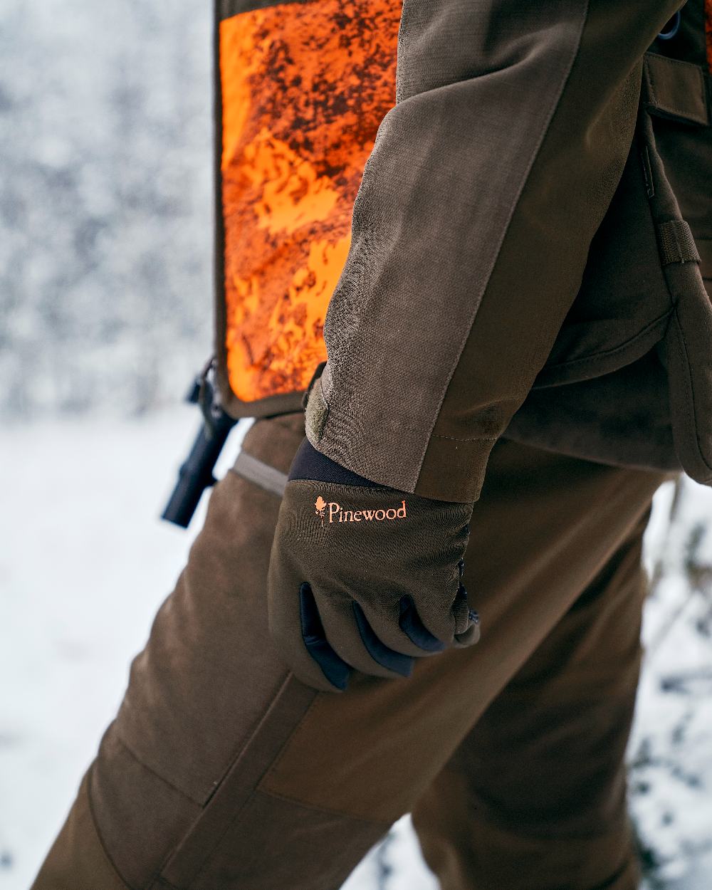 Moss Green Black Coloured Pinewood Hunters Neoprene Gloves on snow background #colour_moss-green-black