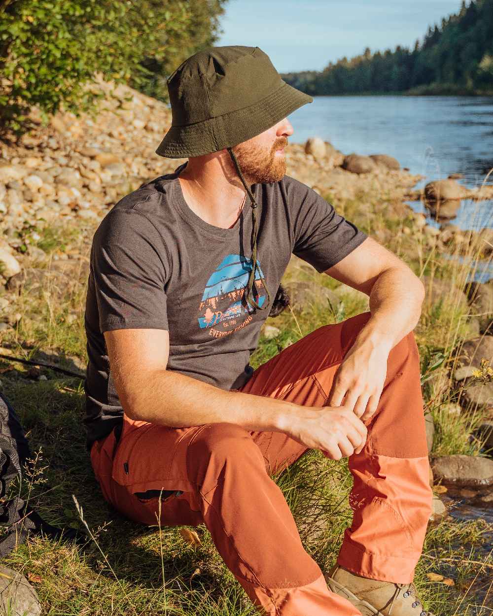 Moss Green Coloured Pinewood Insectsafe Hat on outdoor background #colour_moss-green
