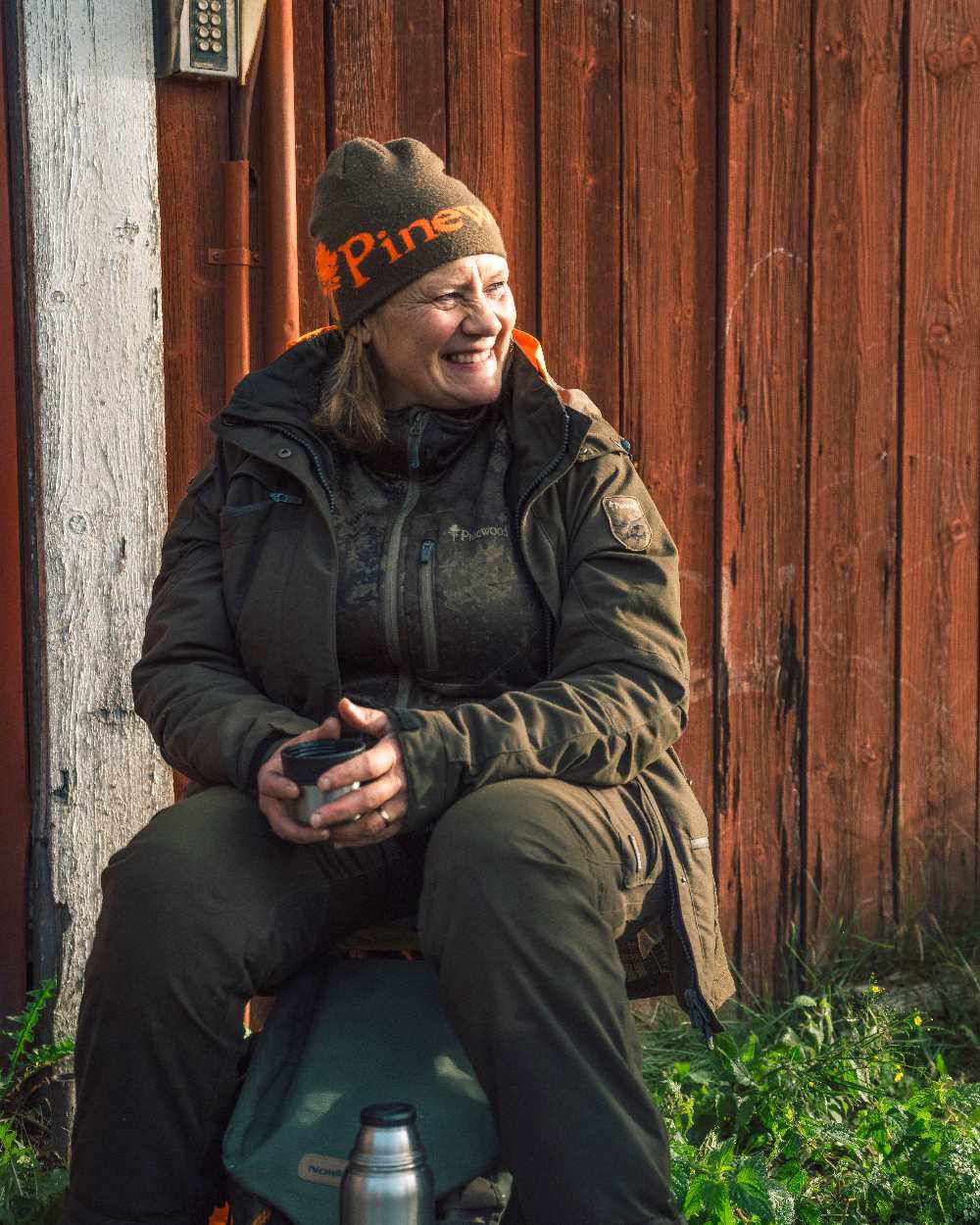 Green Orange Coloured Pinewood Melange Hat on outdoor background #colour_green-orange