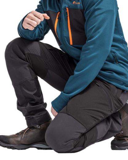 Black Coloured Pinewood Mens Abisko Adventure Trousers on white background #colour_black