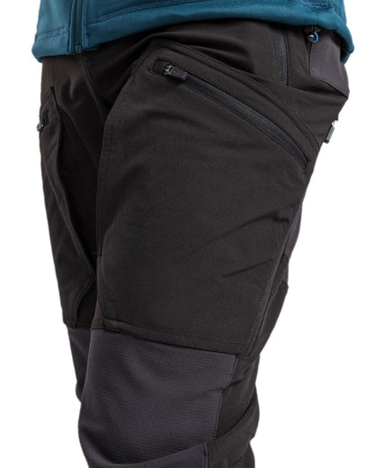 Black Coloured Pinewood Mens Abisko Adventure Trousers on white background #colour_black