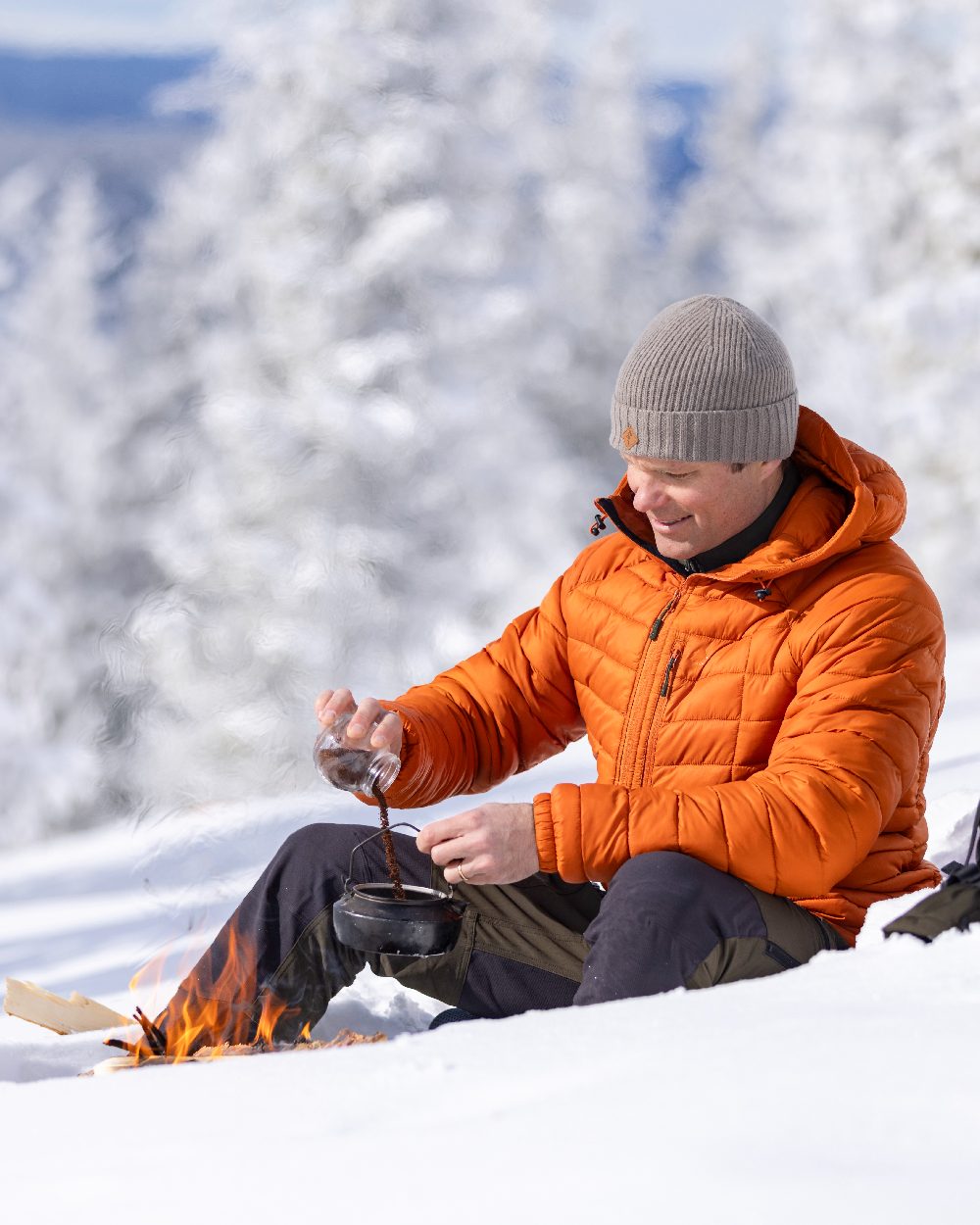 Moss Green Coloured Pinewood Mens Abisko Adventure Trousers on snow background #colour_moss-green