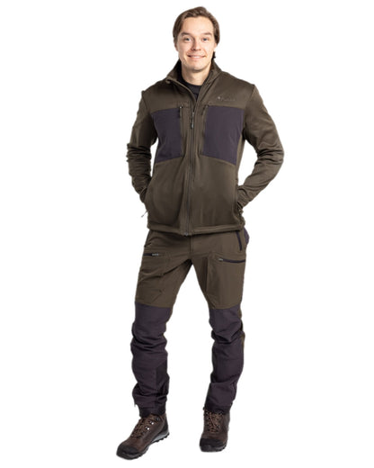 Moss Green Coloured Pinewood Mens Abisko Adventure Trousers on white background #colour_moss-green
