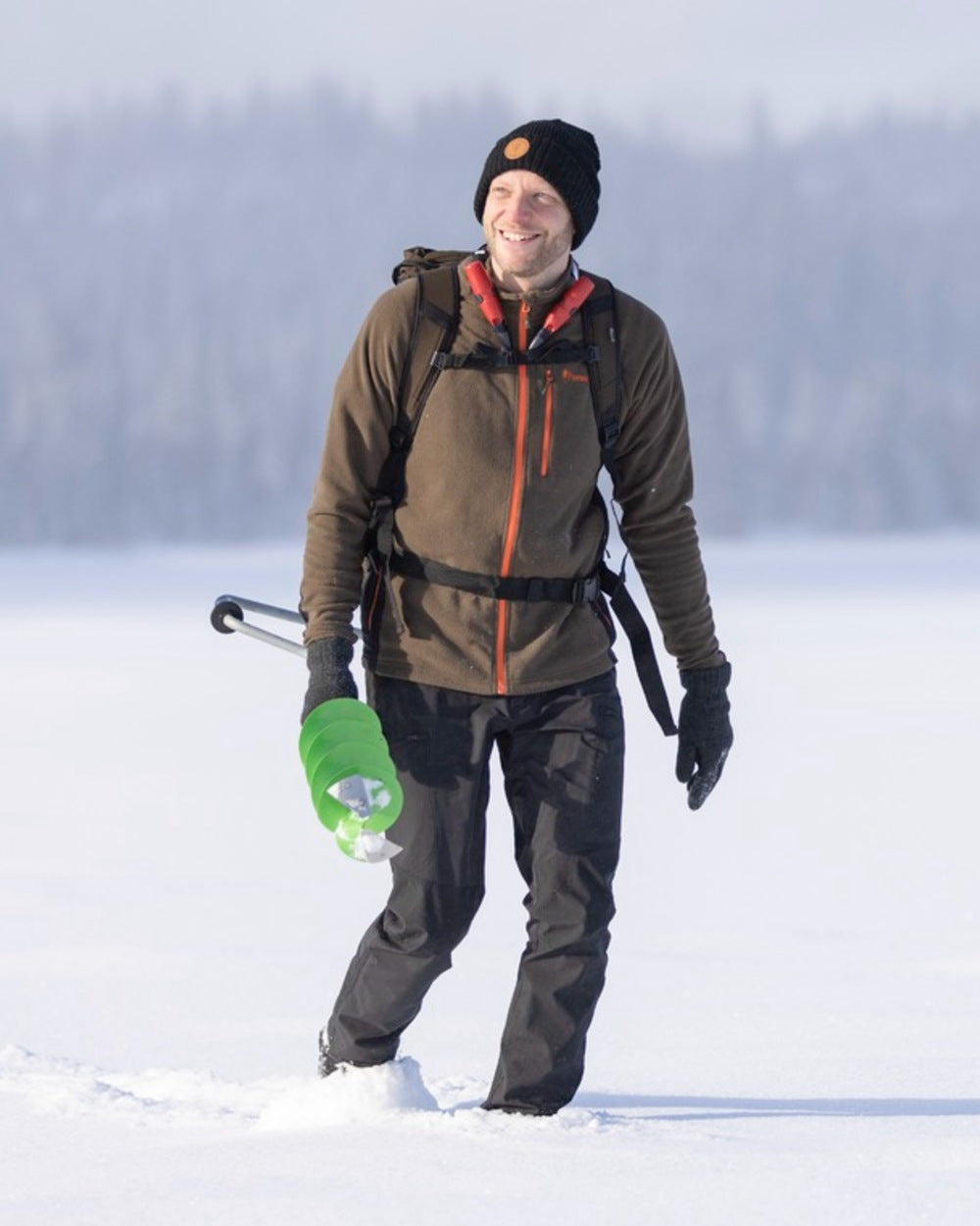Black Coloured Pinewood Mens Abisko Brenton Trousers on snow background #colour_black