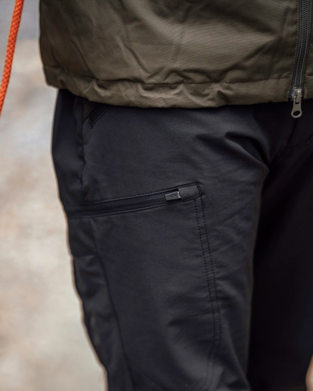 Black Coloured Pinewood Mens Abisko Brenton Trousers on outdoor background #colour_black