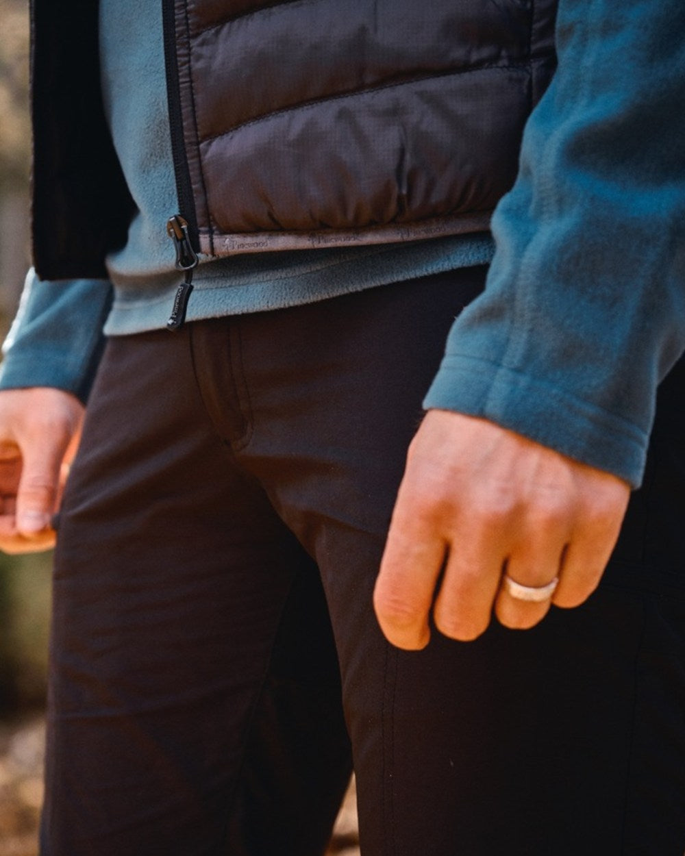 Black Coloured Pinewood Mens Abisko Brenton Trousers on outdoor background #colour_black