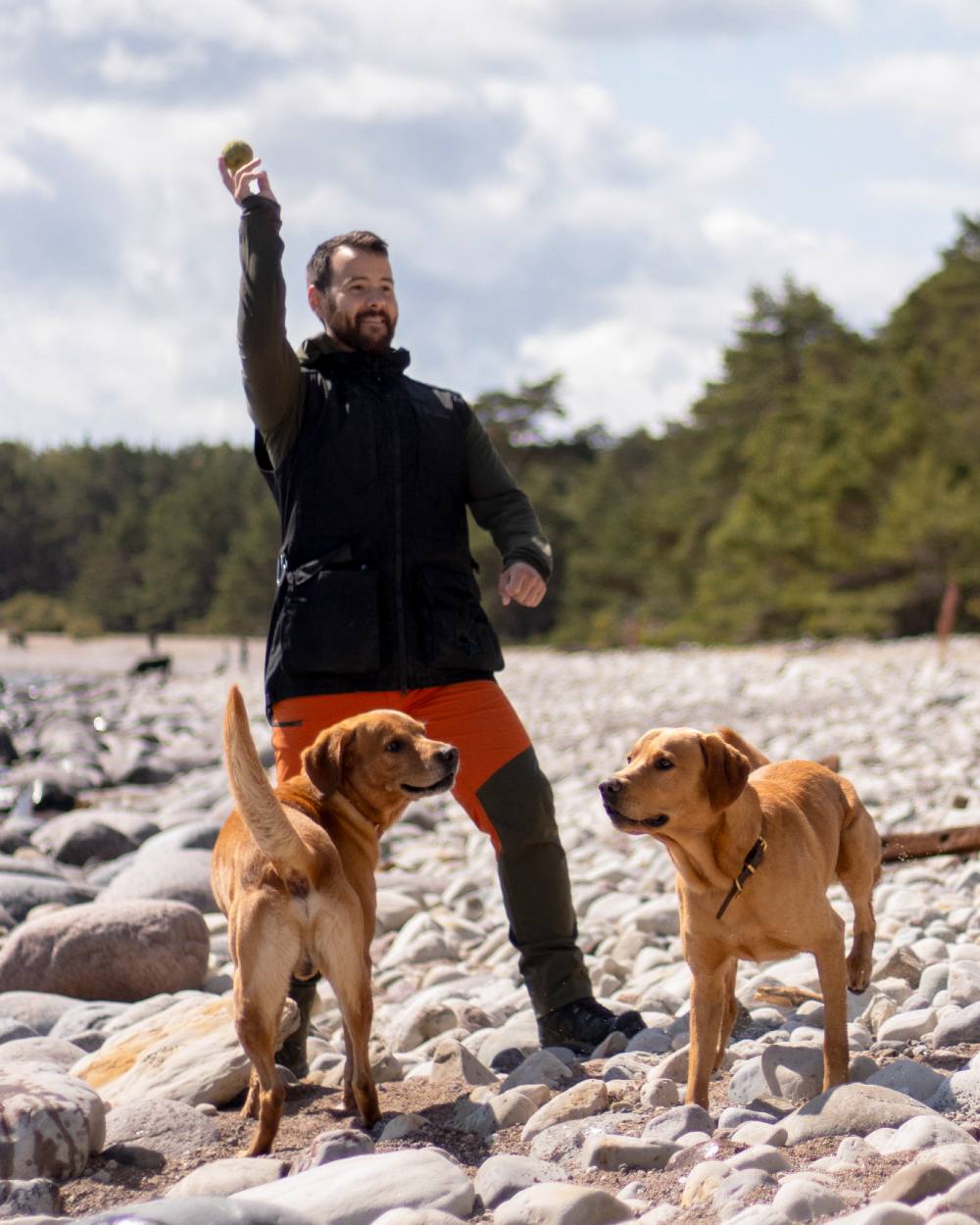 Burned Orange Mossgreen Coloured Pinewood Mens Abisko Brenton Trousers on outdoor background #colour_burned-orange-mossgreen