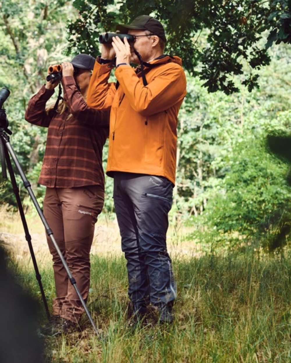 Indigo Blue Coloured Pinewood Mens Abisko Brenton Trousers on forest background #colour_indigo-blue