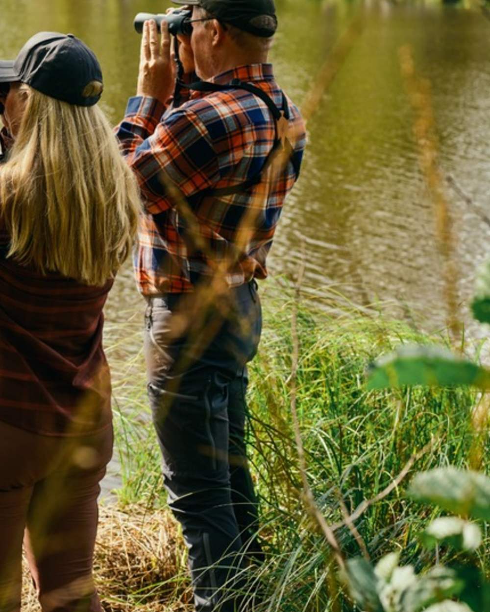 Indigo Blue Coloured Pinewood Mens Abisko Brenton Trousers on forest background #colour_indigo-blue