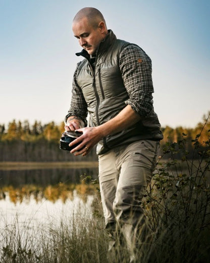 Mole Brown Coloured Pinewood Mens Abisko Brenton Trousers on forest background #colour_mole-brown