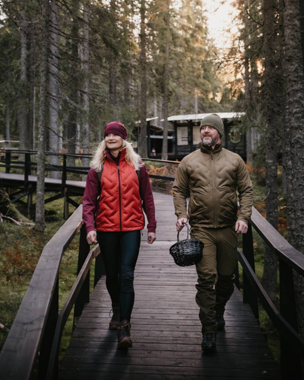 Olive Green Hunting Olive Coloured Pinewood Mens Abisko Brenton Trousers on forest background #colour_olive-green-hunting-olive