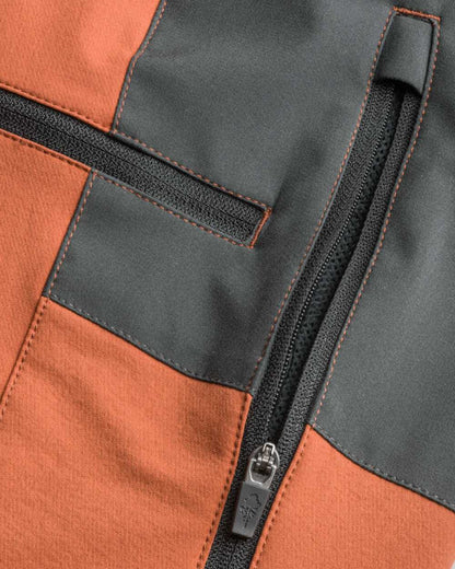 Terracotta Dark Anthracite Coloured Pinewood Mens Abisko Brenton Trousers on outdoor background #colour_terracotta-dark-anthracite