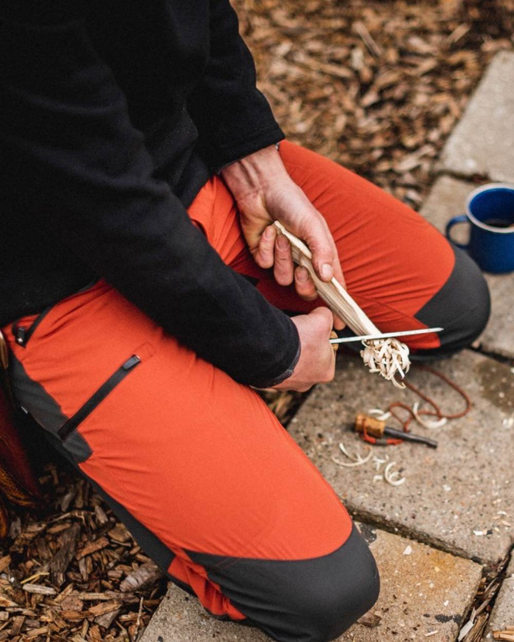 Terracotta Dark Anthracite Coloured Pinewood Mens Abisko Brenton Trousers on outdoor background #colour_terracotta-dark-anthracite