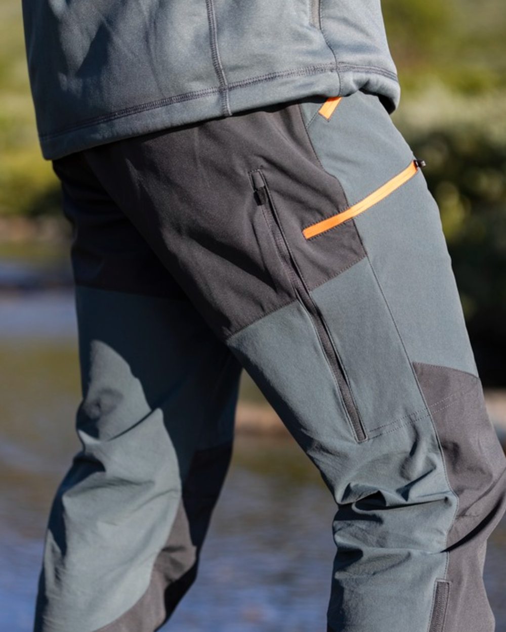 Urban Grey Dark Anthracite Coloured Pinewood Mens Abisko Brenton Trousers on forest background #colour_urban-grey-dark-anthracite