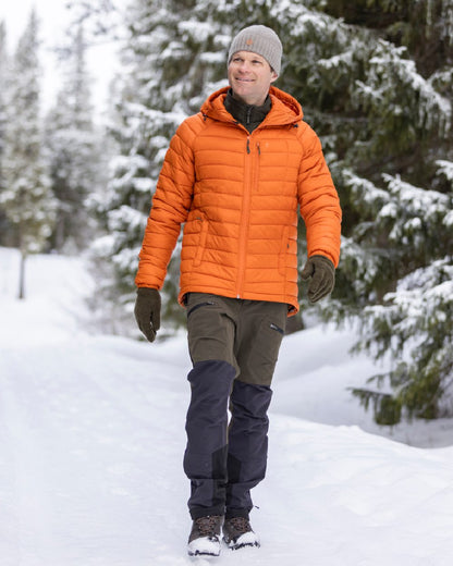 Burned Orange Coloured Pinewood Mens Abisko Insulation Jacket on snow background #colour_burned-orange