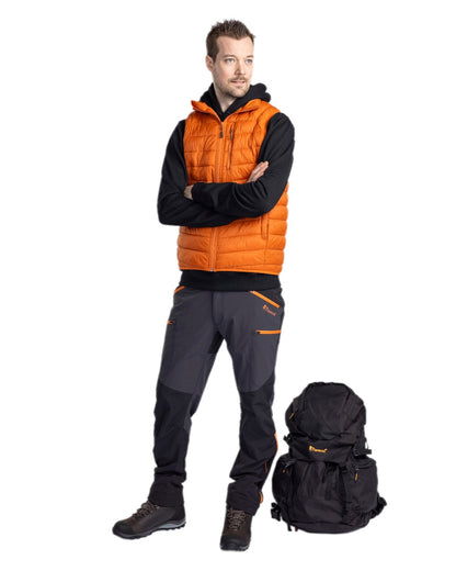 Burned Orange Coloured Pinewood Mens Abisko Insulation Vest on white background #colour_burned-orange