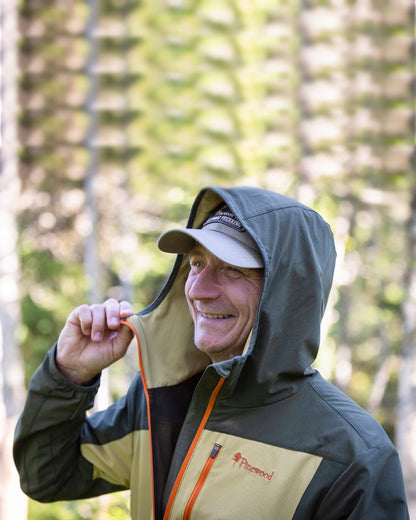 Golden Hay Mossgreen Coloured Pinewood Mens Abisko Light Stretch Jacket on outdoor background #colour_golden-hay-mossgreen