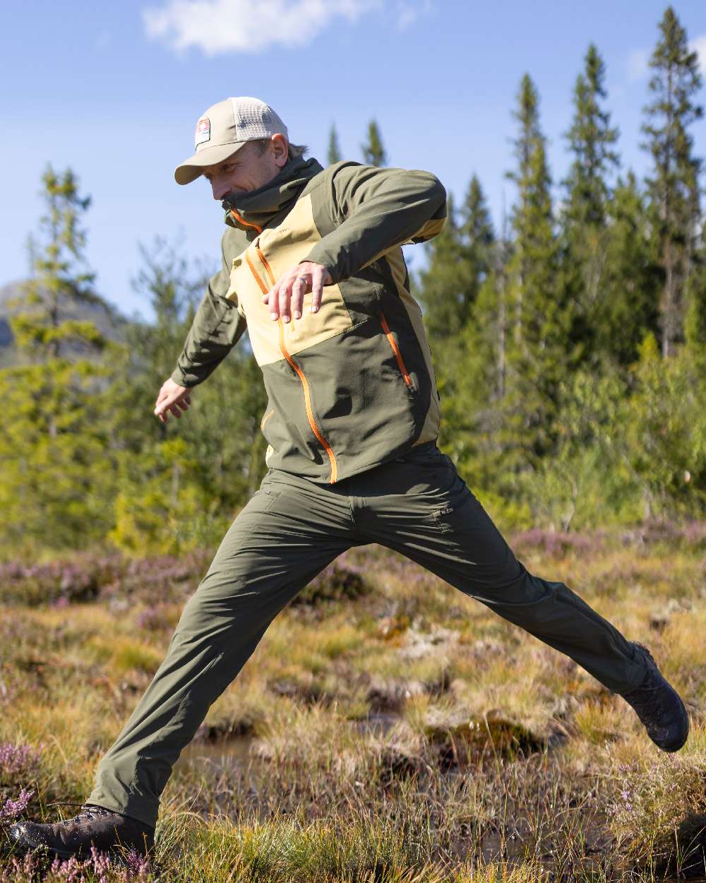 Golden Hay Mossgreen Coloured Pinewood Mens Abisko Light Stretch Jacket on outdoor background #colour_golden-hay-mossgreen