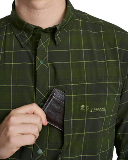 Moss Green Coloured Pinewood Mens Abisko Trekking Long Sleeve Shirt on white background #colour_moss-green