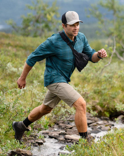 Teal Blue Coloured Pinewood Mens Abisko Trekking Long Sleeve Shirt on outdoor background #colour_teal-blue