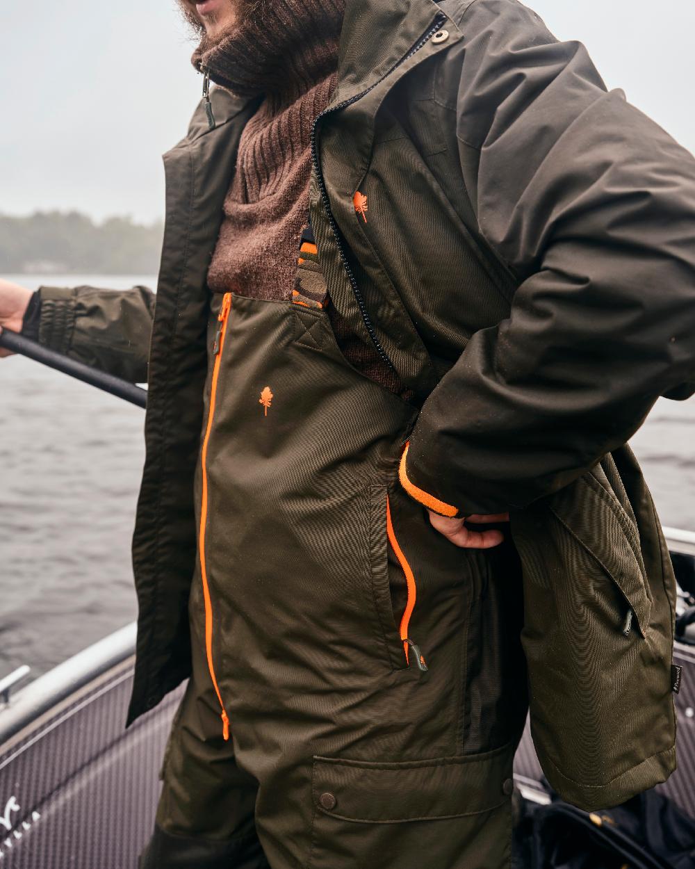 Green Dark Green Coloured Pinewood Mens Bolmen Fishing Jacket on outdoor background #colour_green-dark-green