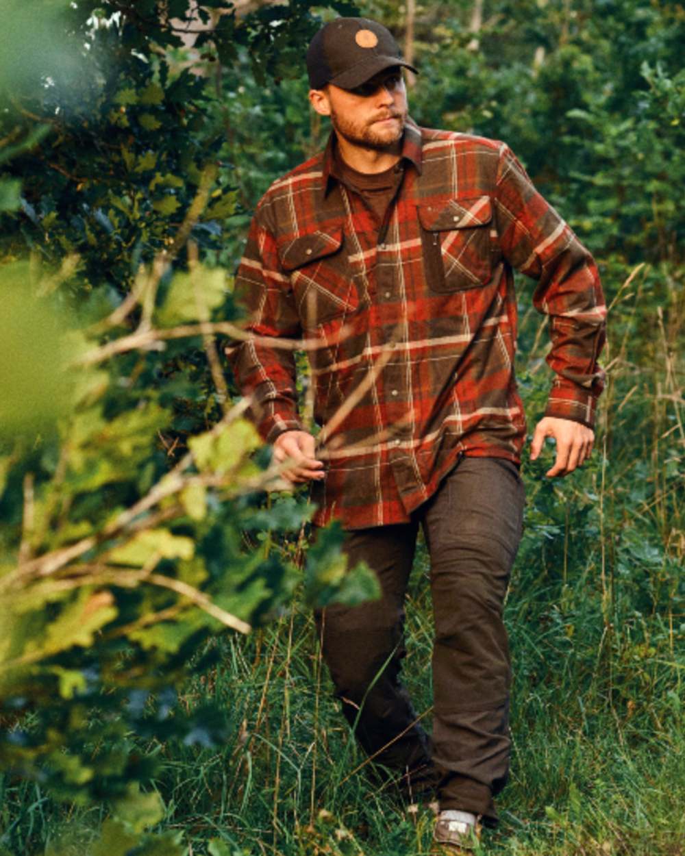 Dark Mossgreen Coloured Pinewood Mens Caribou Hunting Trousers on outdoor background #colour_dark-mossgreen