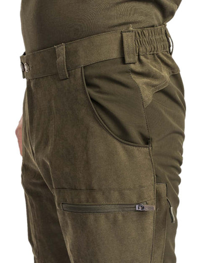 Dark Mossgreen Coloured Pinewood Mens Caribou Hunting Trousers on white background #colour_dark-mossgreen