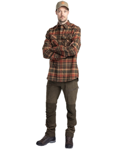 Dark Mossgreen Coloured Pinewood Mens Caribou Hunting Trousers on white background #colour_dark-mossgreen