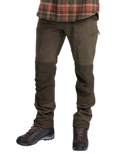 Dark Mossgreen Coloured Pinewood Mens Caribou Hunting Trousers on white background #colour_dark-mossgreen