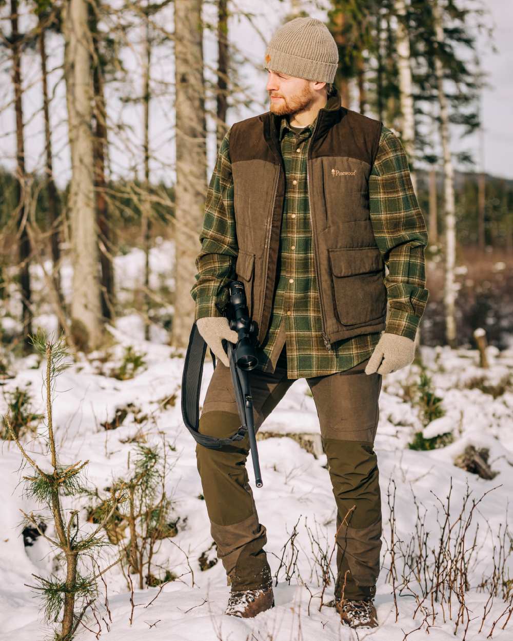 Suede Brown Dark Olive Coloured Pinewood Mens Caribou Hunting Trousers on outdoor background #colour_suede-brown-dark-olive